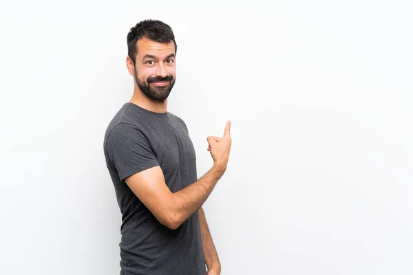 Jonge Knappe Man Geïsoleerde Witte Achtergrond Wijzen Terug — Stockfoto