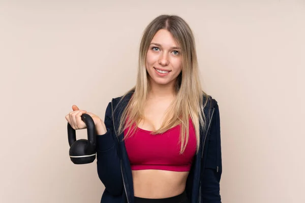 Ung Sport Blond Kvinna Över Isolerad Bakgrund Gör Tyngdlyftning Med — Stockfoto