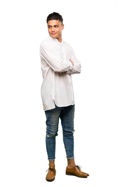 A full-length shot of a Young man portrait over isolated white background