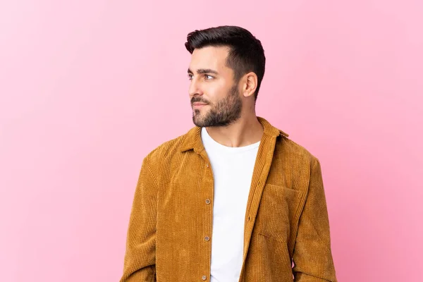 Young Handsome Man Beard Wearing Corduroy Jacket Pink Background Looking — 스톡 사진