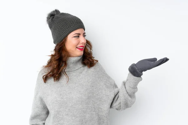 Young Russian Woman Winter Hat Isolated White Background Holding Copyspace — ストック写真