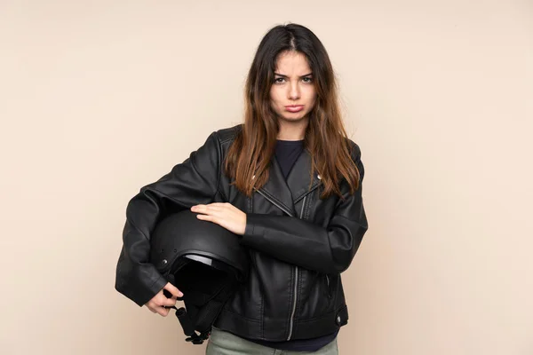 Woman Motorcycle Helmet Isolated Beige Background Sad — Stock Photo, Image