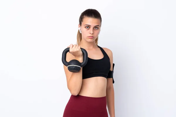 Teenager Sport Lány Elszigetelt Fehér Háttér Hogy Súlyemelés Kettlebell Nézi — Stock Fotó