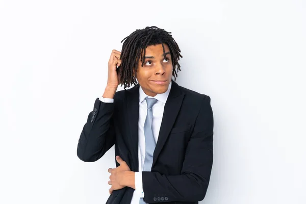 Junger Afrikanisch Amerikanischer Geschäftsmann Vor Isoliertem Weißen Hintergrund Mit Zweifeln — Stockfoto