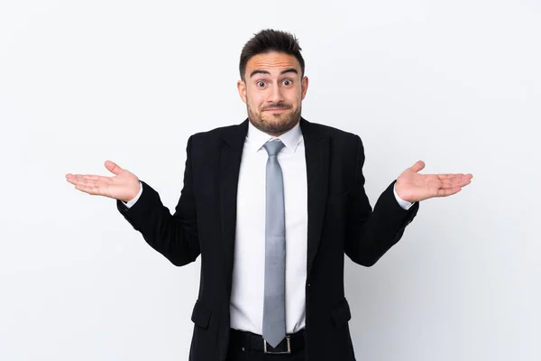 Junger Geschäftsmann Mit Isoliertem Hintergrund Hat Zweifel Mit Verwirrtem Gesichtsausdruck — Stockfoto