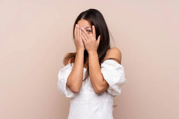 Young Brazilian Girl Isolated Background Covering Eyes Looking Fingers — Stock Photo, Image