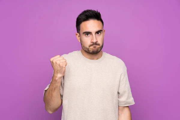Young Handsome Man Isolated Purple Background Angry Gesture — 스톡 사진