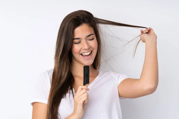 Menina Adolescente Sobre Fundo Isolado Com Pente Cabelo Canto — Fotografia de Stock