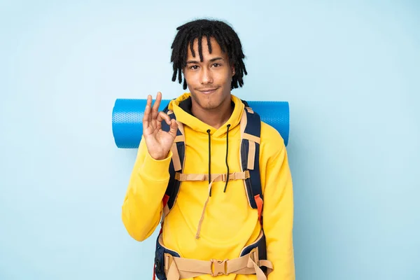 Young Mountaineer African American Man Big Backpack Isolated Blue Background — Stock Photo, Image