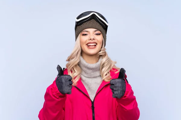 Lyžař Teenager Dívka Snowboarding Brýle Přes Izolované Modré Pozadí Dává — Stock fotografie