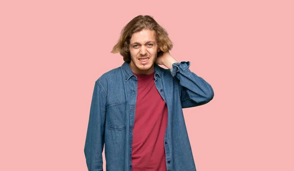 Blonde Man Having Doubts Colorful Background — Stock Photo, Image