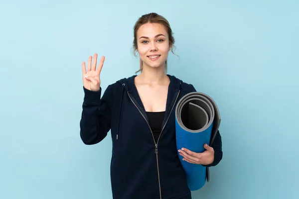 Tini Orosz Lány Holding Mat Elszigetelt Kék Háttér Boldog Számolás — Stock Fotó