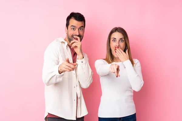 Couple Valentine Day Isolated Pink Background Pointing Finger Someone Laughing — Stock Photo, Image