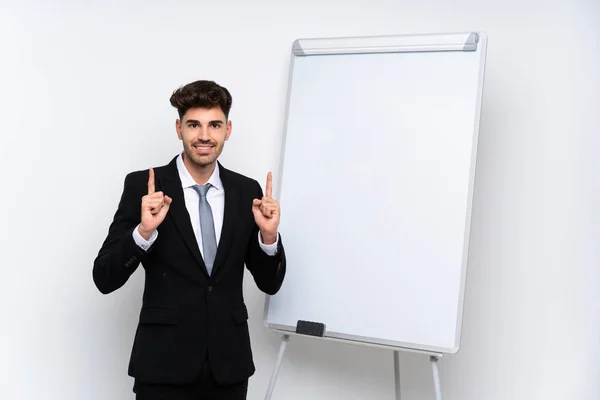 Joven Empresario Dando Una Presentación Pizarra Blanca Señalando Una Gran —  Fotos de Stock