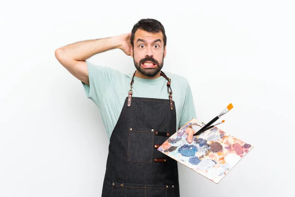 Jonge Kunstenaar Man Met Een Palet Geïsoleerde Achtergrond Gefrustreerd Neemt — Stockfoto