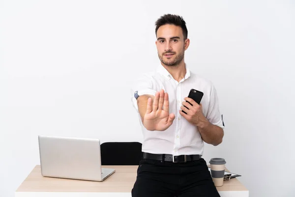 Young Business Man Mobile Phone Workplace Making Stop Gesture Her — Stok fotoğraf