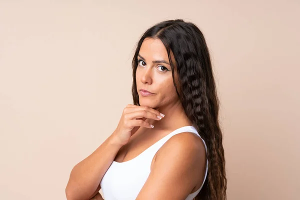 Portrait of young woman over isolated background