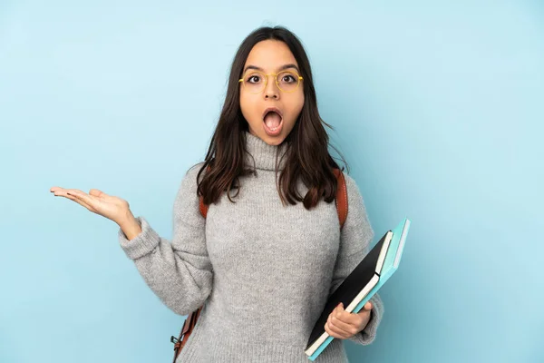 Young Mixed Race Woman Going School Isolated Blue Background Shocked — Stock Photo, Image