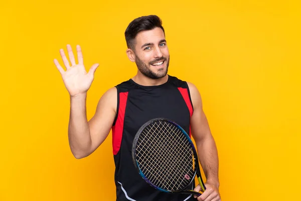 Tennis Player Man Isolated Yellow Wall Saluting Hand Happy Expression — Stock Photo, Image