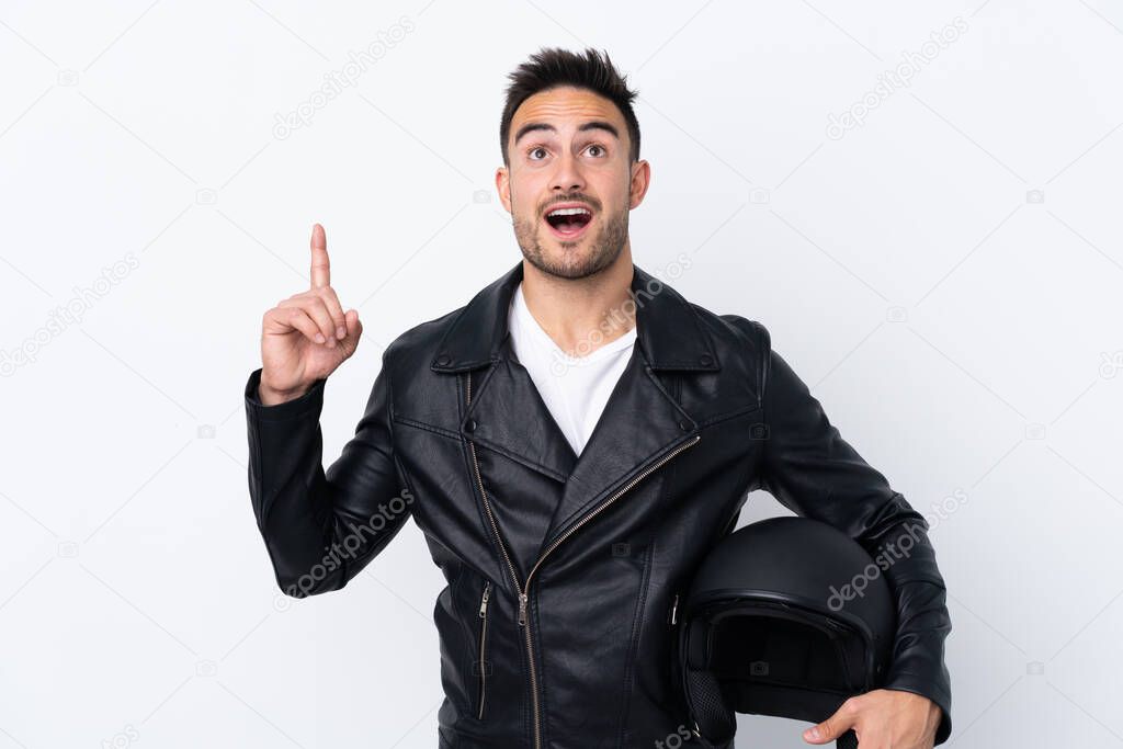 Man with a motorcycle helmet pointing up and surprised