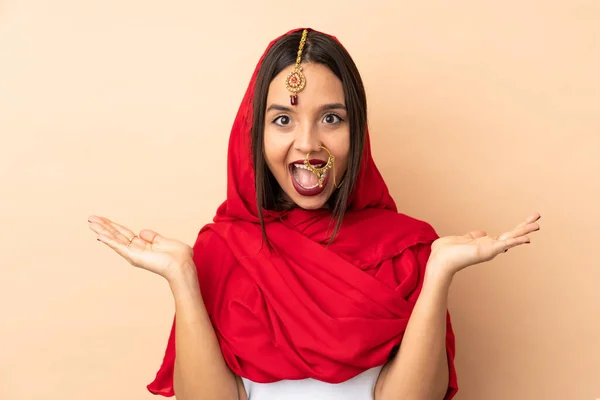 Young Indian Woman Isolated Beige Background Shocked Facial Expression — Stock Photo, Image