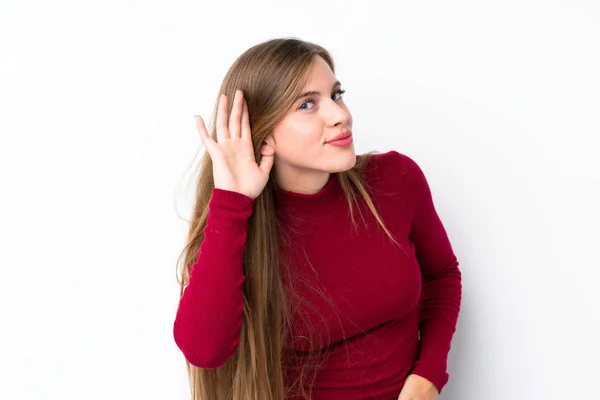 Adolescente Chica Rubia Sobre Fondo Blanco Aislado Escuchando Algo Poniendo — Foto de Stock