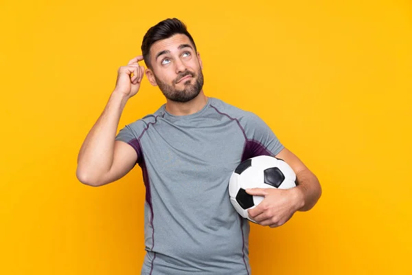 Football Player Man Isolated Background Having Doubts Confuse Face Expression — Stock Photo, Image