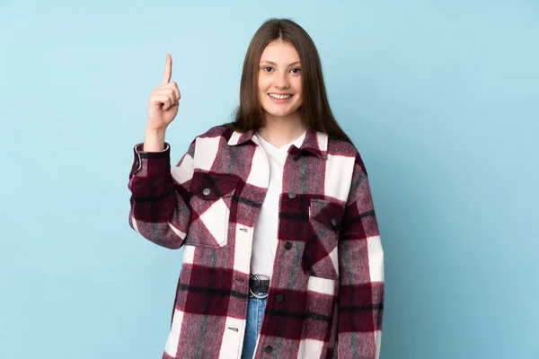 Adolescente Caucasiano Menina Isolado Fundo Azul Apontando Para Uma Grande — Fotografia de Stock