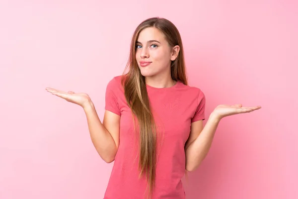 Teenager Blonde Girl Isolated Pink Background Having Doubts Confuse Face — Stock Photo, Image