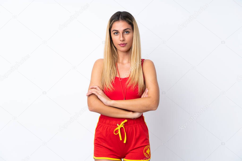 Lifeguard woman over isolated white background keeping arms crossed