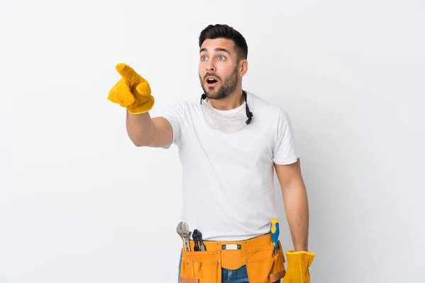 Craftsmen Electrician Man Isolated White Background Pointing Away — Stock Photo, Image