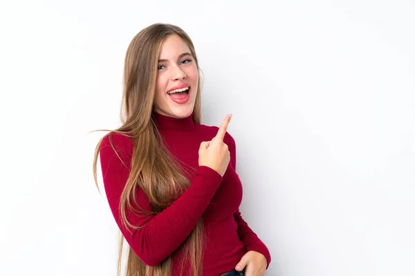 Ragazza Bionda Adolescente Sfondo Bianco Isolato Sorpreso Indicando Lato — Foto Stock