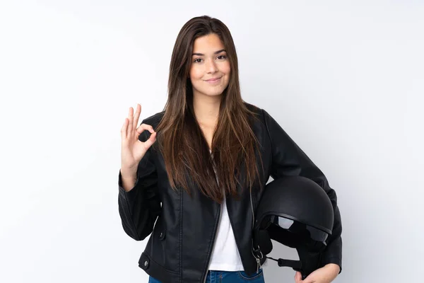 若いです女性とともにオートバイヘルメット上の隔離された白い背景ショーA Signとともに指 — ストック写真