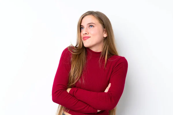 Menina Loira Adolescente Sobre Fundo Branco Isolado Fazendo Gestos Dúvidas — Fotografia de Stock