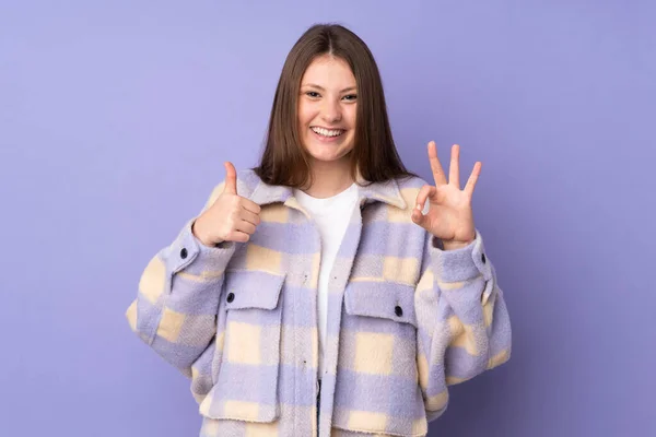 Teenager Caucasian Girl Isolated Purple Background Showing Sign Thumb Gesture — Stock Photo, Image