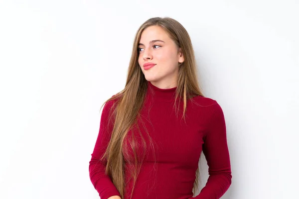 Adolescente Menina Loira Sobre Isolado Fundo Branco Fazendo Dúvidas Gesto — Fotografia de Stock