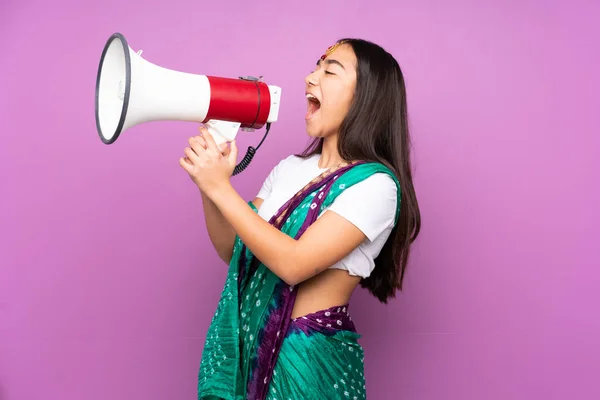 Young Indian Woman Sari Isolated Background Shouting Megaphone — Stock Photo, Image
