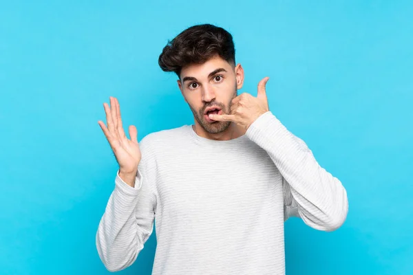 Young Man Isolated Blue Background Making Phone Gesture Doubting — Stock Photo, Image