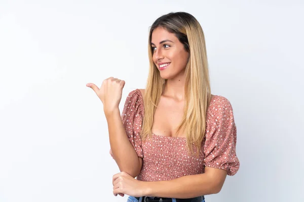 Jeune Femme Uruguayenne Sur Fond Blanc Isolé Pointant Vers Côté — Photo