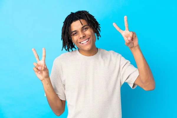 Young African American Man Isolated Blue Background Showing Victory Sign — Stock Photo, Image