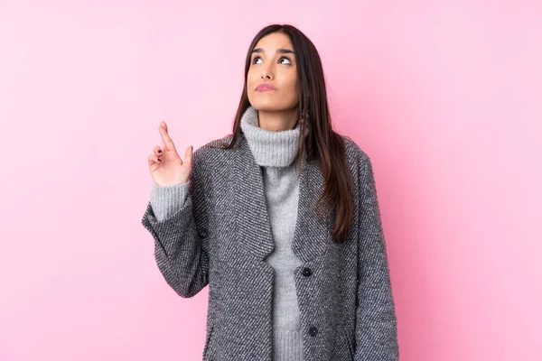 Young Brunette Woman Isolated Pink Background Fingers Crossing Wishing Best — 스톡 사진