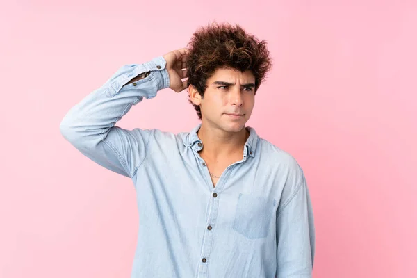 Young Caucasian Man Jean Shirt Isolated Pink Background Having Doubts — Stock Photo, Image