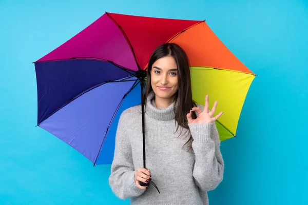 Jeune Femme Brune Tenant Parapluie Sur Mur Bleu Isolé Montrant — Photo