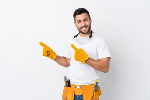 Craftsmen Electrician Man Isolated White Background Pointing Finger Side — Stock Photo, Image
