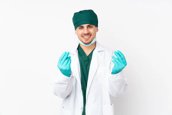 Surgeon Green Uniform Isolated Isolated White Background Making Money Gesture — Stock Photo, Image