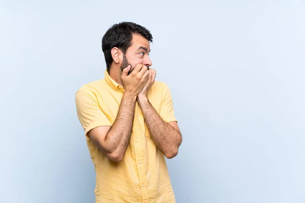 Young Man Beard Isolated Blue Background Nervous Scared Putting Hands — Stock Photo, Image