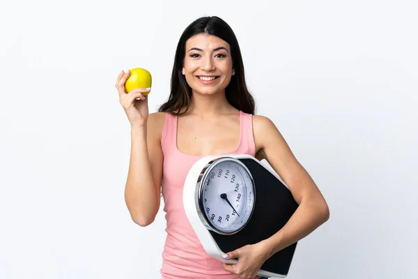 Junge Brünette Mädchen Über Isolierten Weißen Hintergrund Mit Wiegemaschine Und — Stockfoto