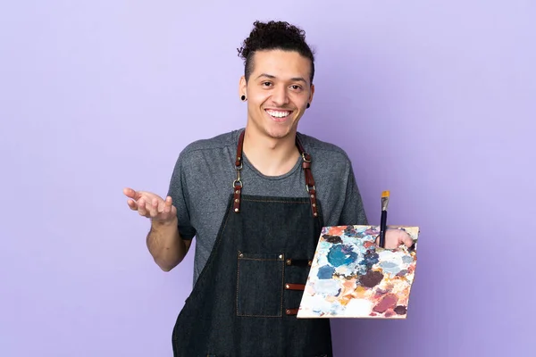 Young Artist Man Holding Palette Isolated Purple Background Shocked Facial — Stock Photo, Image