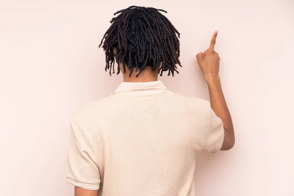 Young African American Man Isolated Background Pointing Back Index Finger — Stock Photo, Image