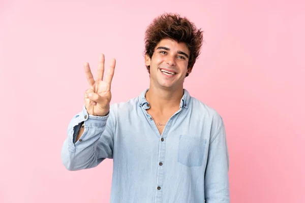 Joven Hombre Caucásico Con Camisa Jean Sobre Fondo Rosa Aislado —  Fotos de Stock